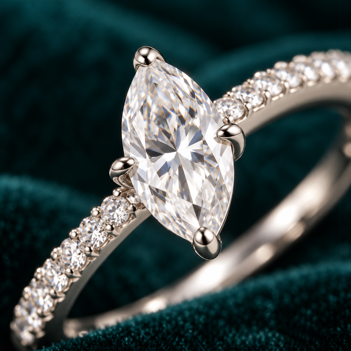 Alba Ring close-up of the marquise centre stone and pave shoulders