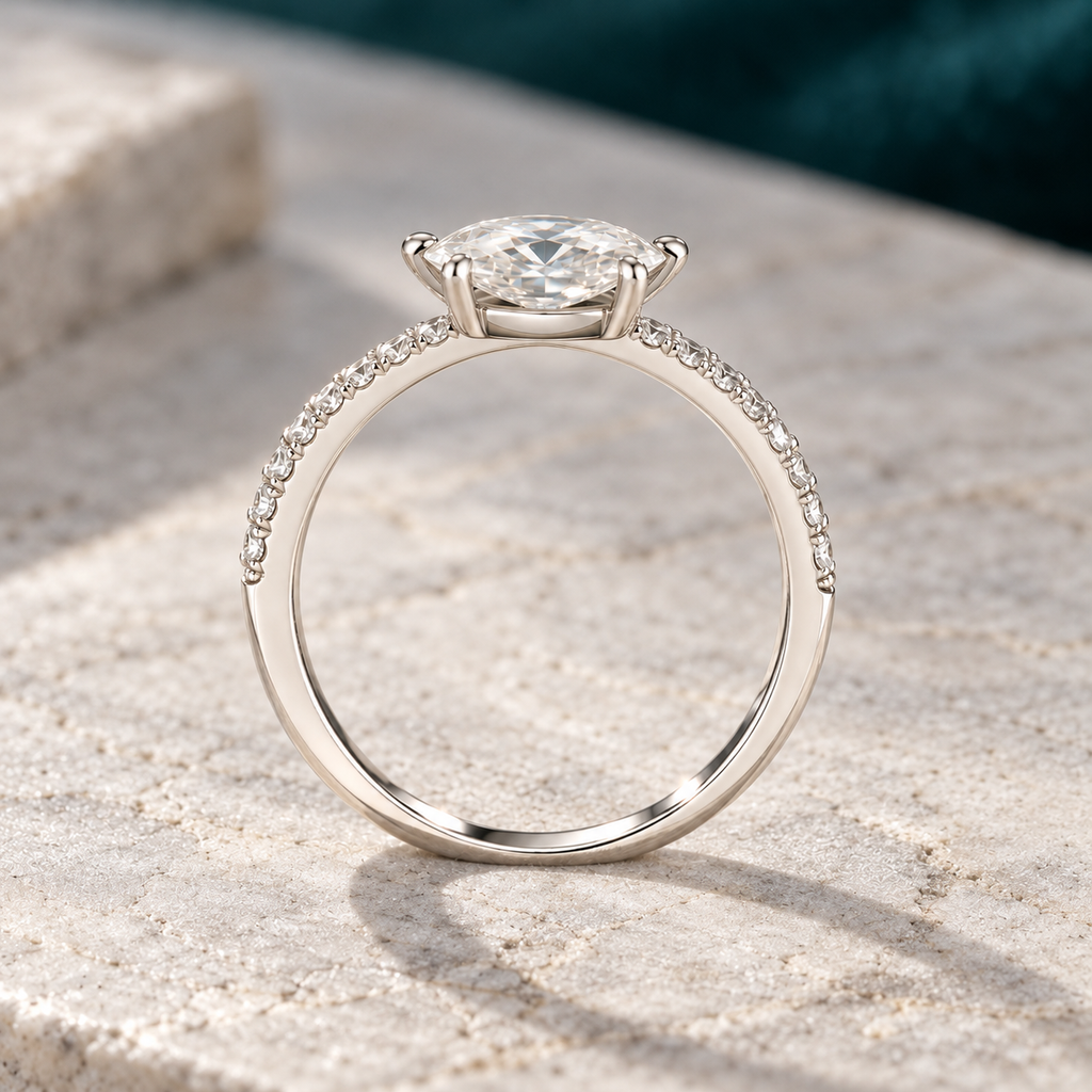 Alba ring on a pale stone slab