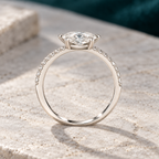 Alba ring on a pale stone slab