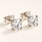 Clemence Stud Earrings on an off-white background