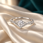 Corin Crown Ring resting on ivory satin