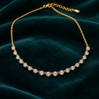 Dara Choker Necklace: gold-tone choker with a front row of individually set round moissanite stones on teal velvet