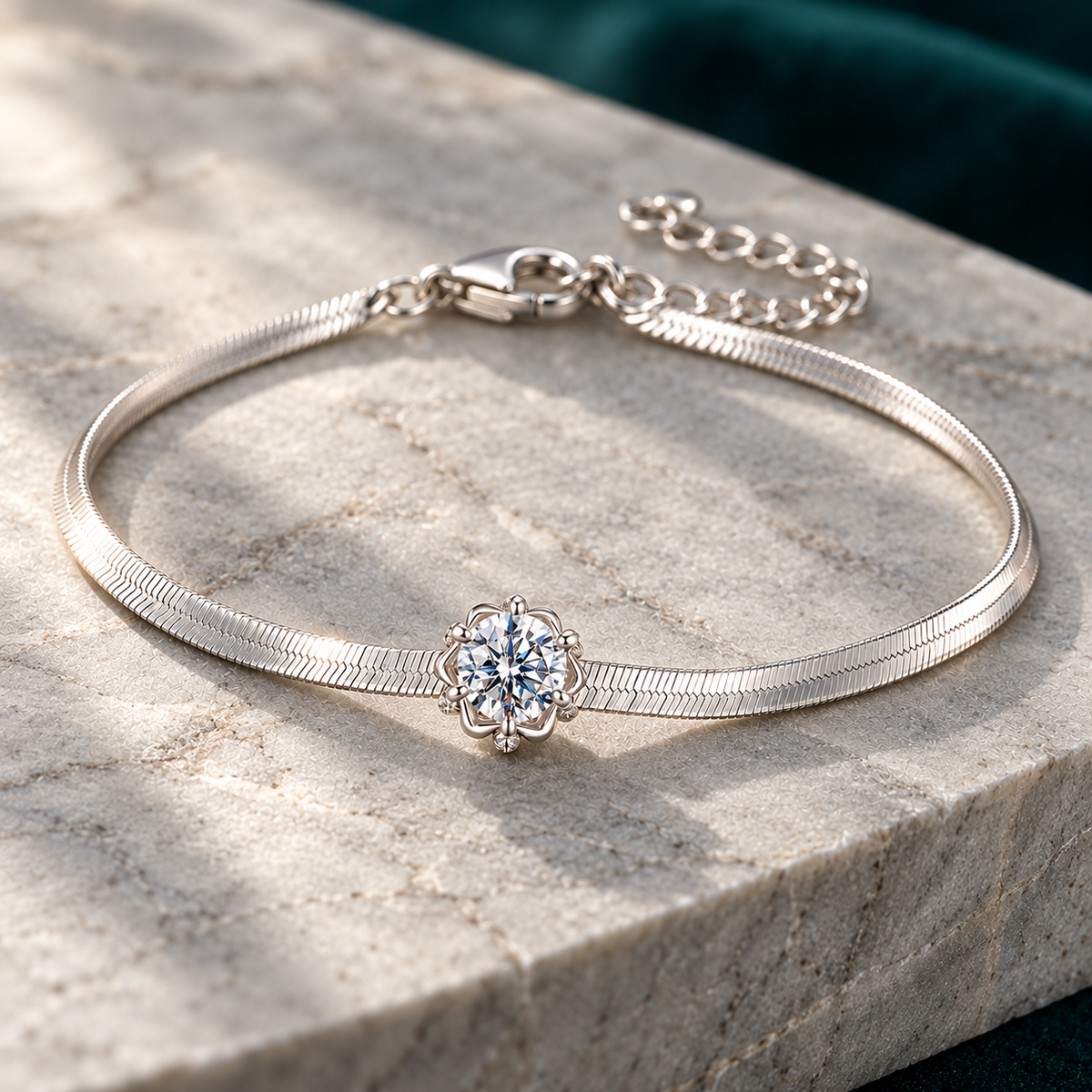 Elara Chain Bracelet on a pale stone slab