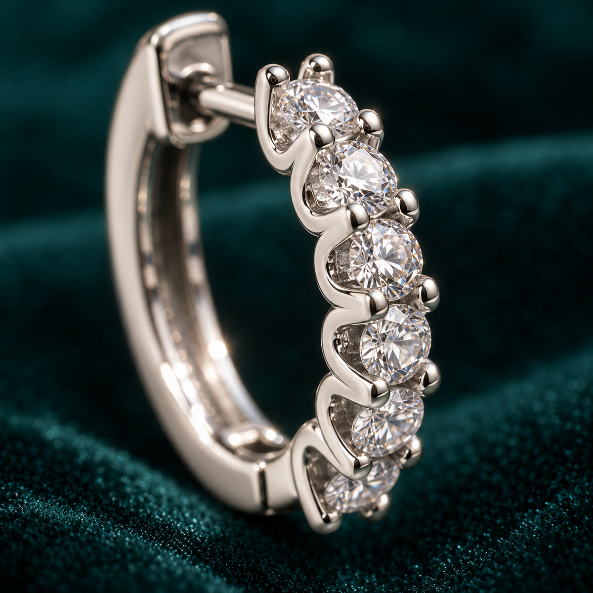 Genevieve hoop close-up of the claw-set round stones
