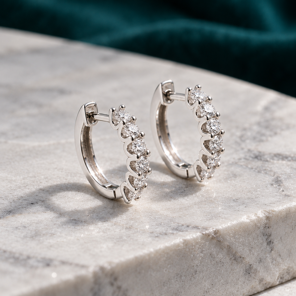 Genevieve Hoop Earrings on a pale stone slab