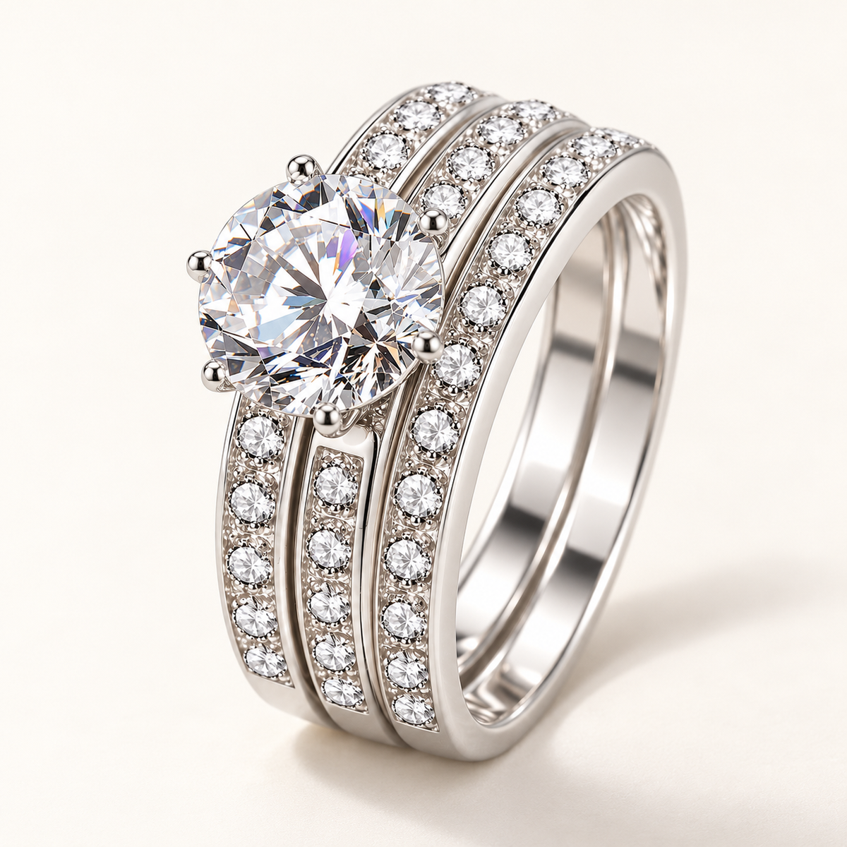Hedy triple-band ring on an off-white background