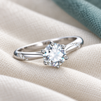 Neve Solitaire Ring — ivory textile and muted teal editorial