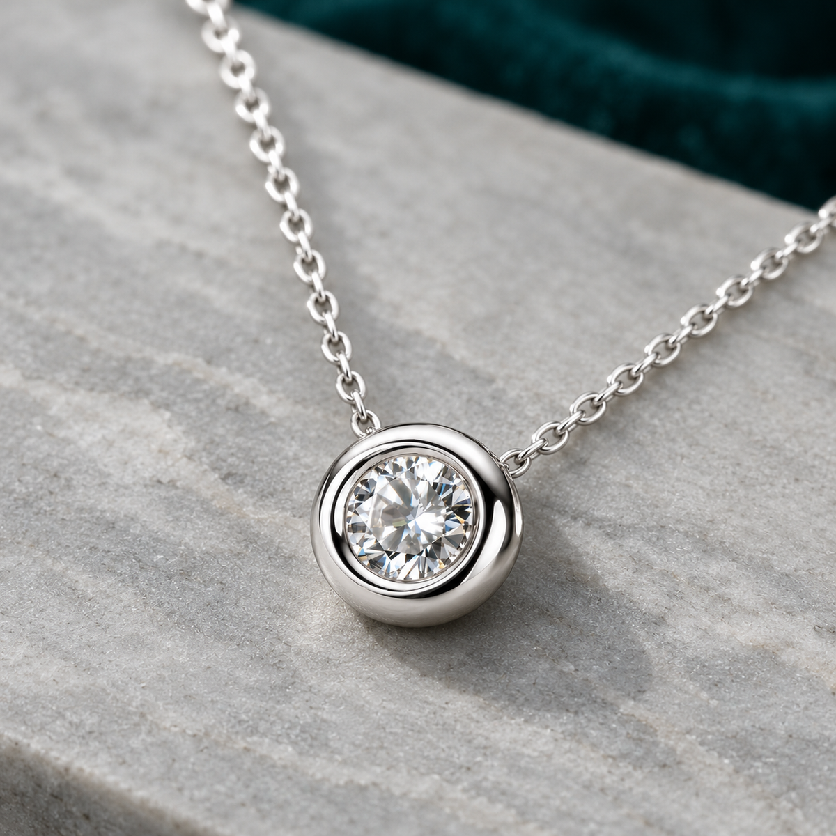 Petra Pendant Necklace on a pale stone slab