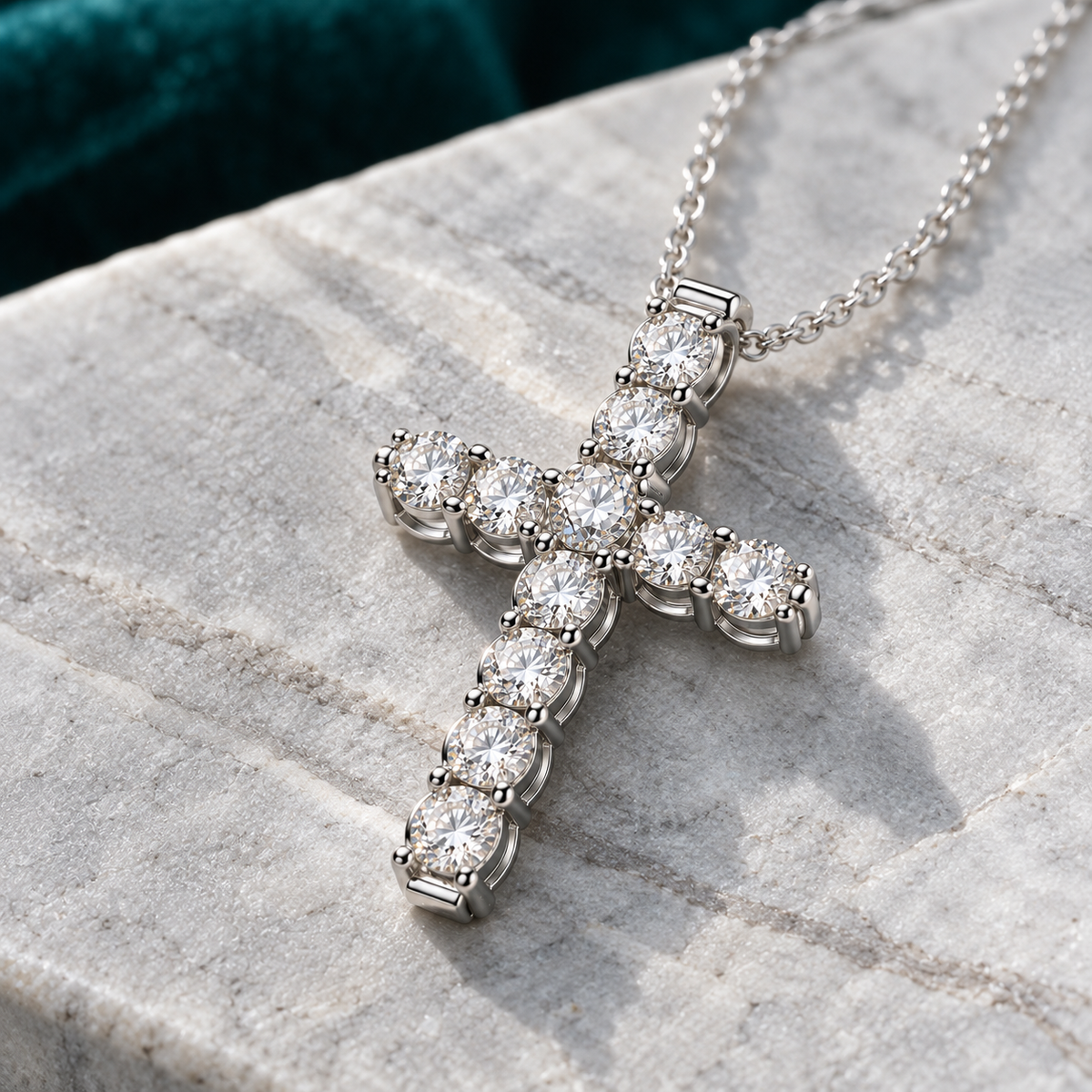 Viviane Cross Necklace on a pale stone slab