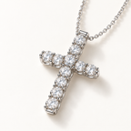 Viviane Cross Necklace on an off-white background